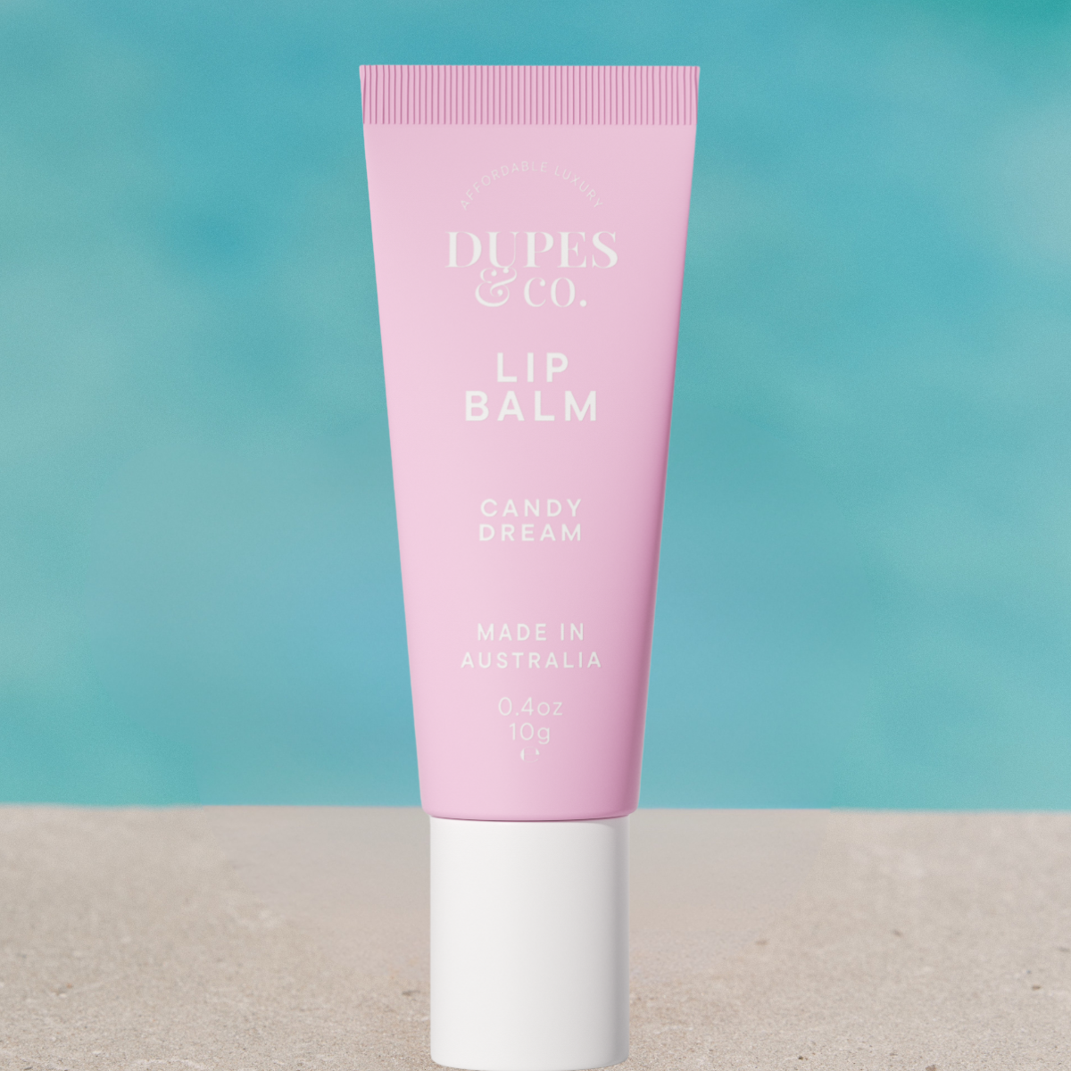 Dupes & Co Candy Dream Lip Balm tube front view