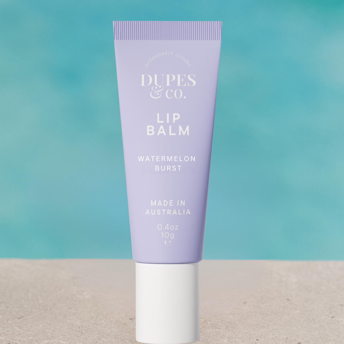 Dupes & Co Watermelon Burst Lip Balm tube front view