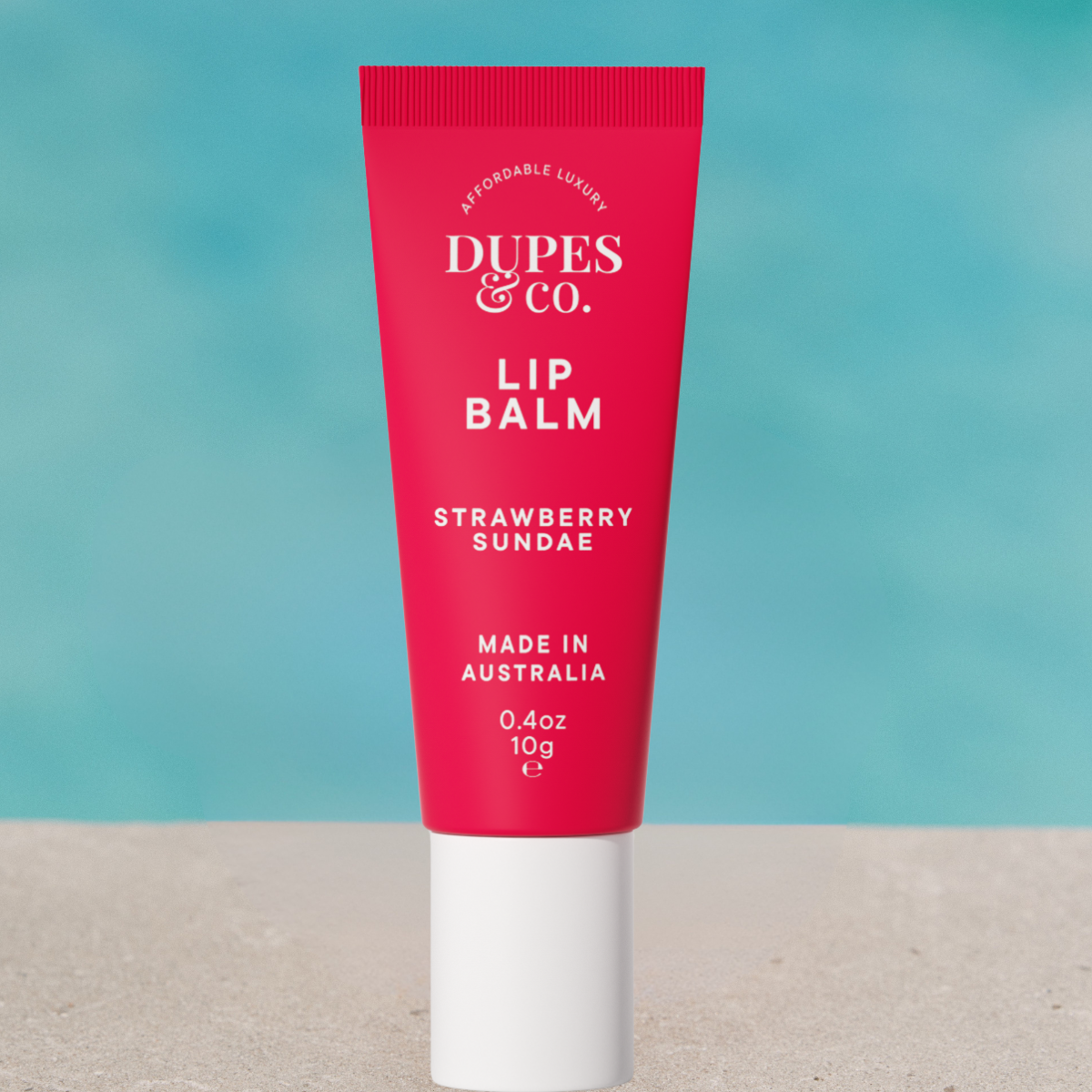 Dupes & Co Strawberry Sundae Lip Balm tube front view
